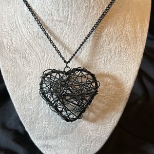 Black twisted metal heart necklace